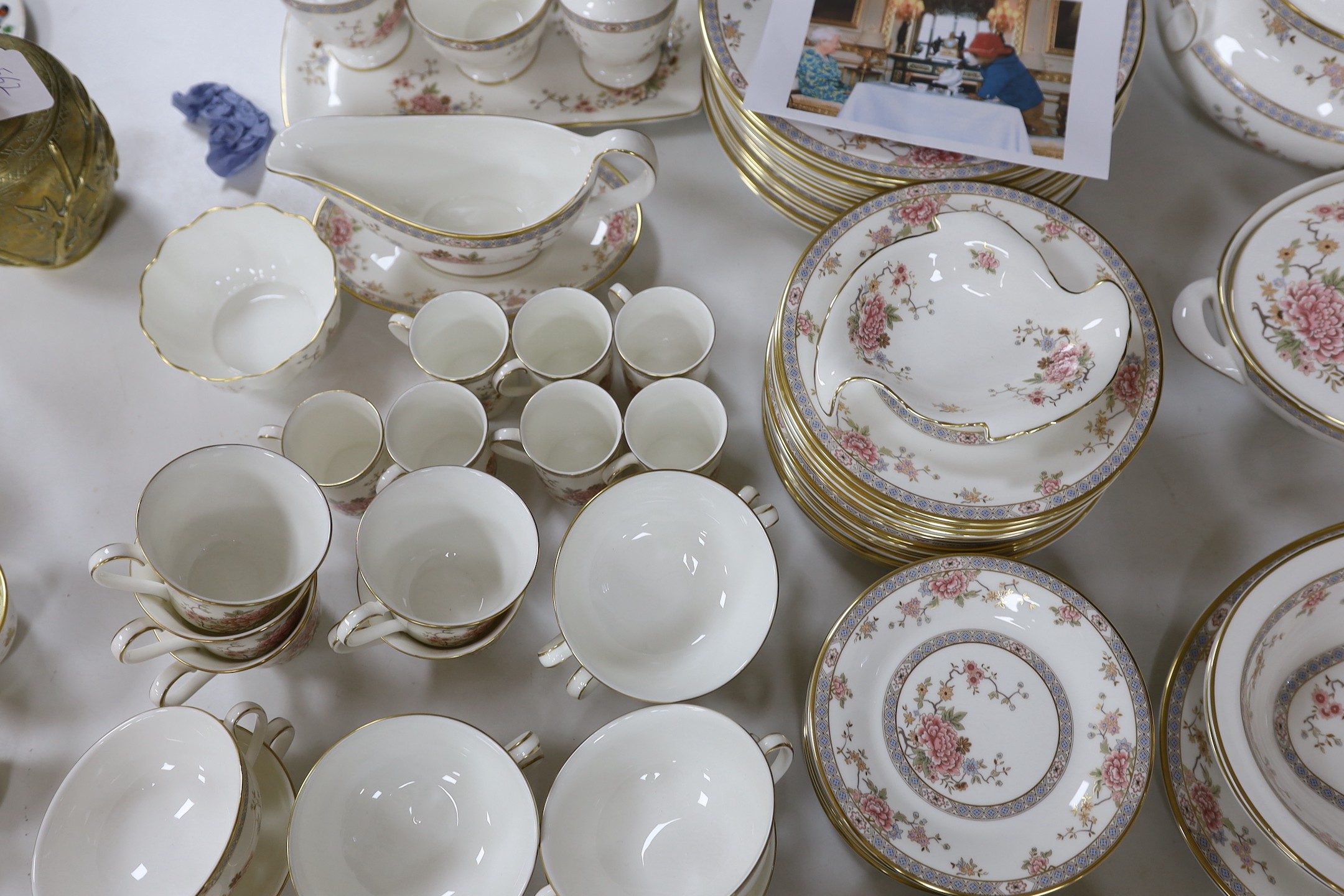 An extensive Royal Doulton Canton pattern dinner service as used by The Queen and Paddington bear in the Jubilee sketch